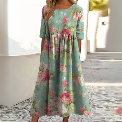 Mandy | Midi-jurk met bloemenprint en moeiteloze buikbedekking